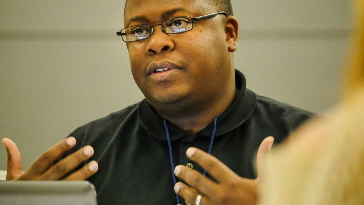 person talking to group at 2014 conference