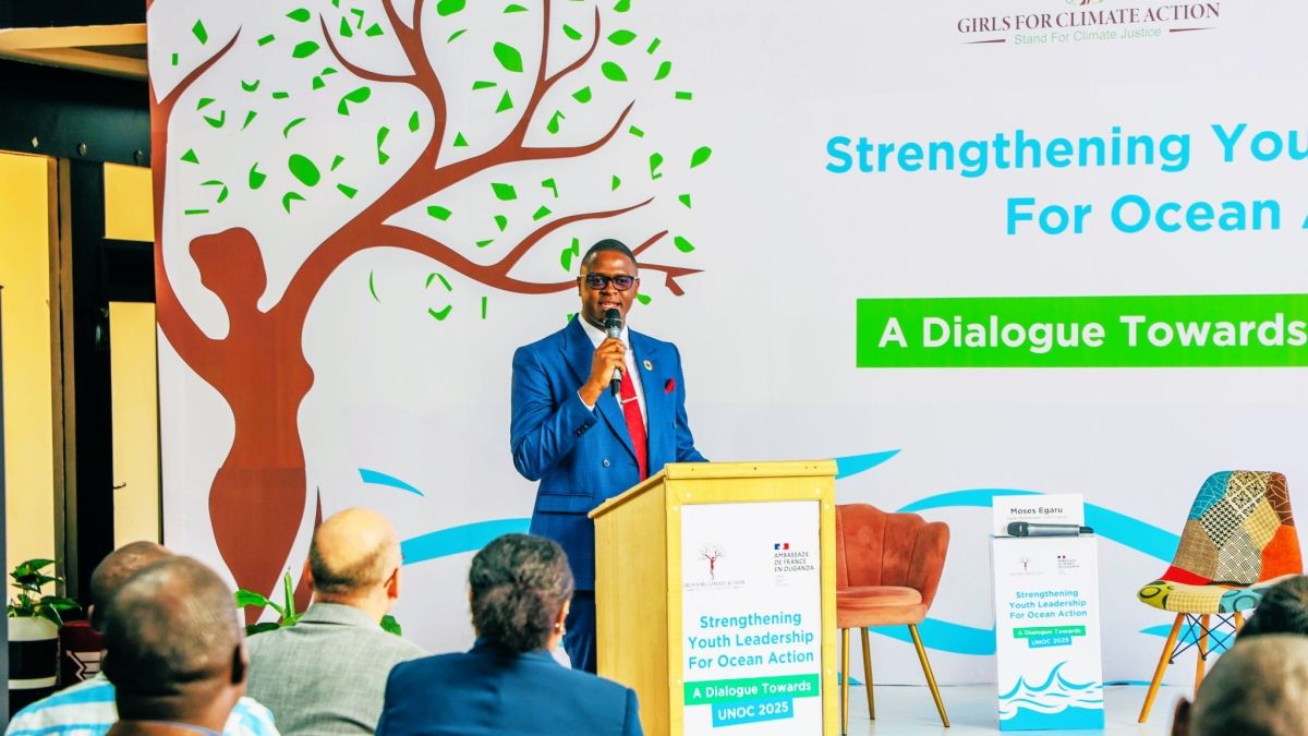 A young man speaking on a stage