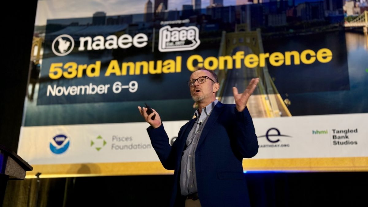 Sean Southey delives a keynote presentation at NAAEE 2024 in Pittsburgh, Pennsylvania