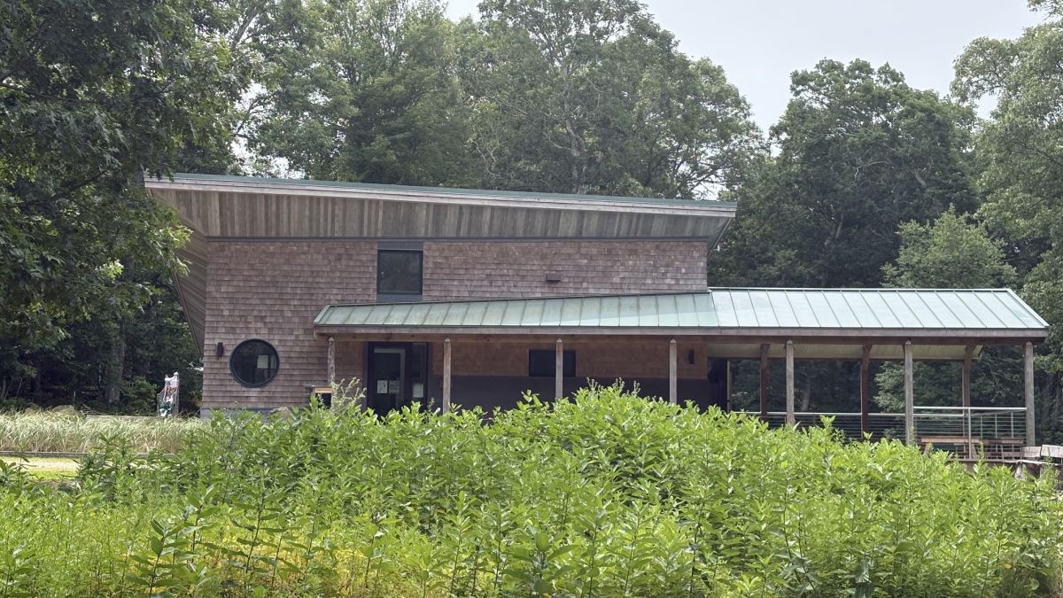 Living Building Challenge Welcome Center surrounded by trees