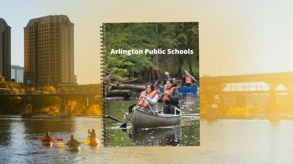 Notebook mock-up with photo of students paddling a canoe