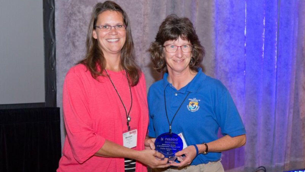 The Prairie Science Class Receives NAAEE's Award for Outstanding Service to EE by an Organization at the Regional Level at NAAEE's 2015 Annual Conference in San Diego, CA. 
