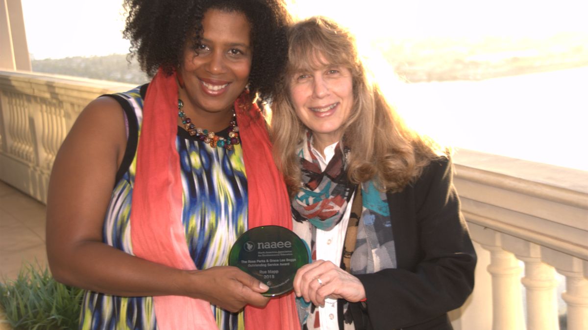 NAAEE Executive Director Judy Braus presents Outdoor Afro Founder Rue Mapp with NAAEE's Rosa Parks and Grace Lee Boggs Award in 2015.