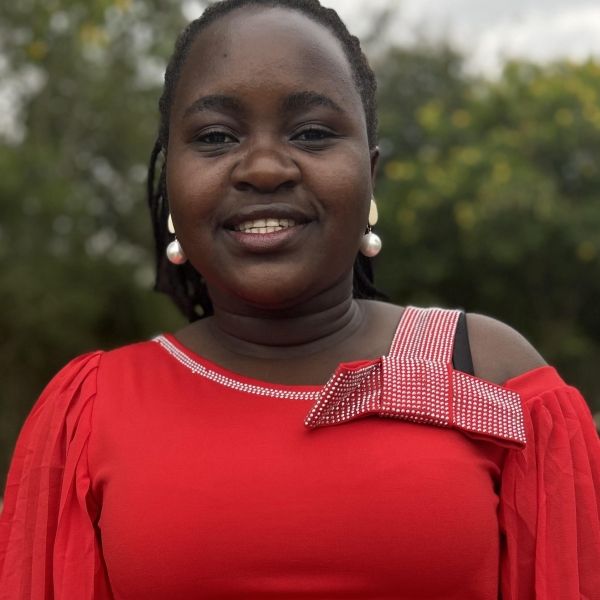 Headshot of woman wearing red