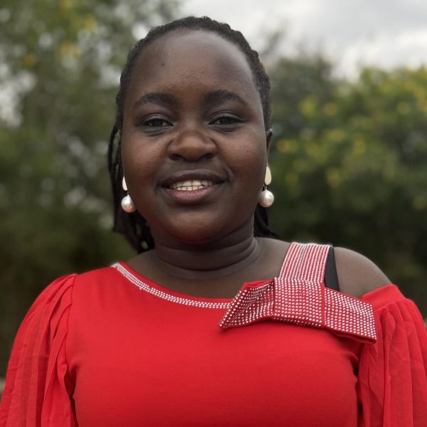Headshot of woman wearing red