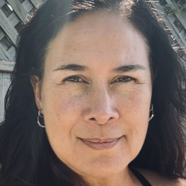 Headshot of woman outside