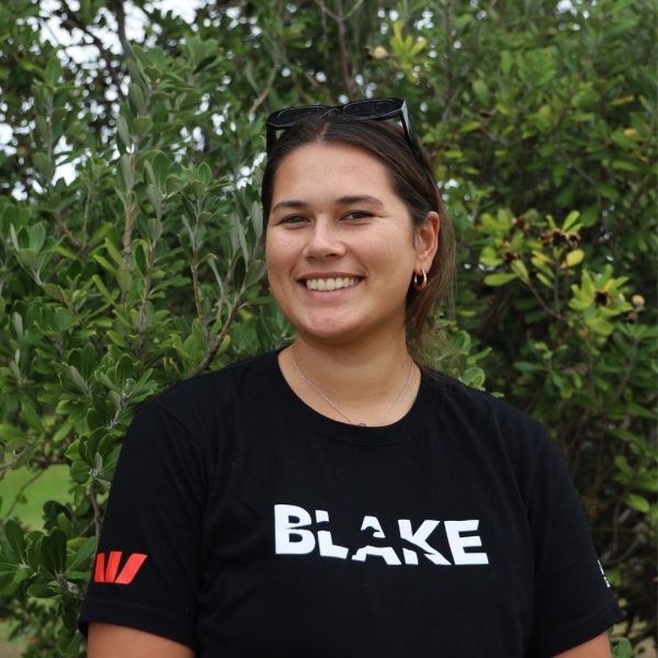 Ginny outside in a BLAKE t-shirt