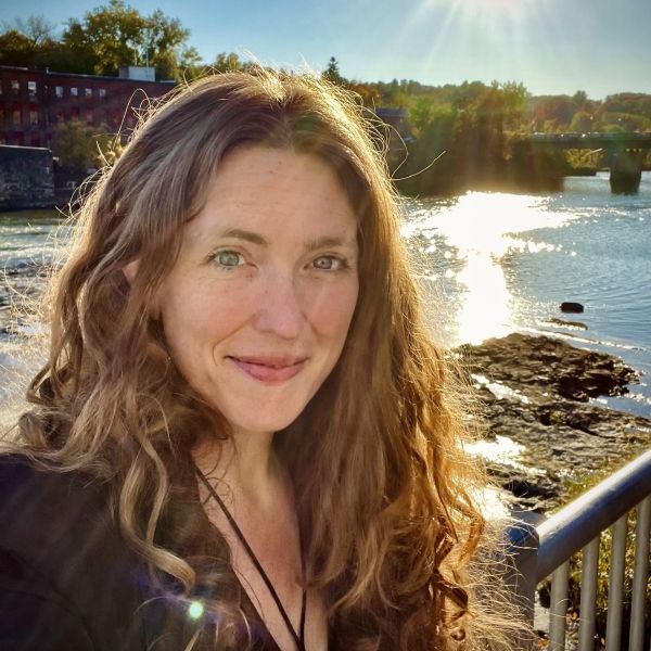 Kit Harrington in front of lake