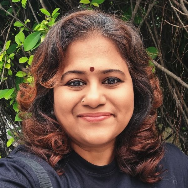 Woman in black t-shirt outdoors