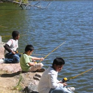 Kids fishing off greenway