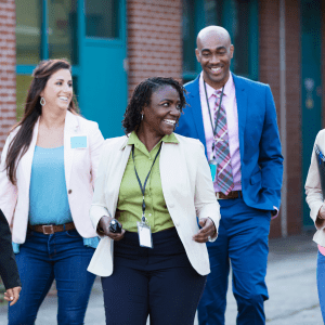 Group of teachers walk outside