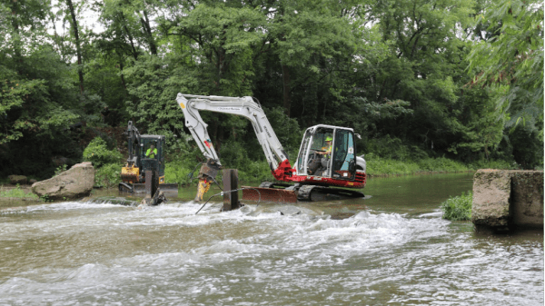 Image of a dam being removed. 