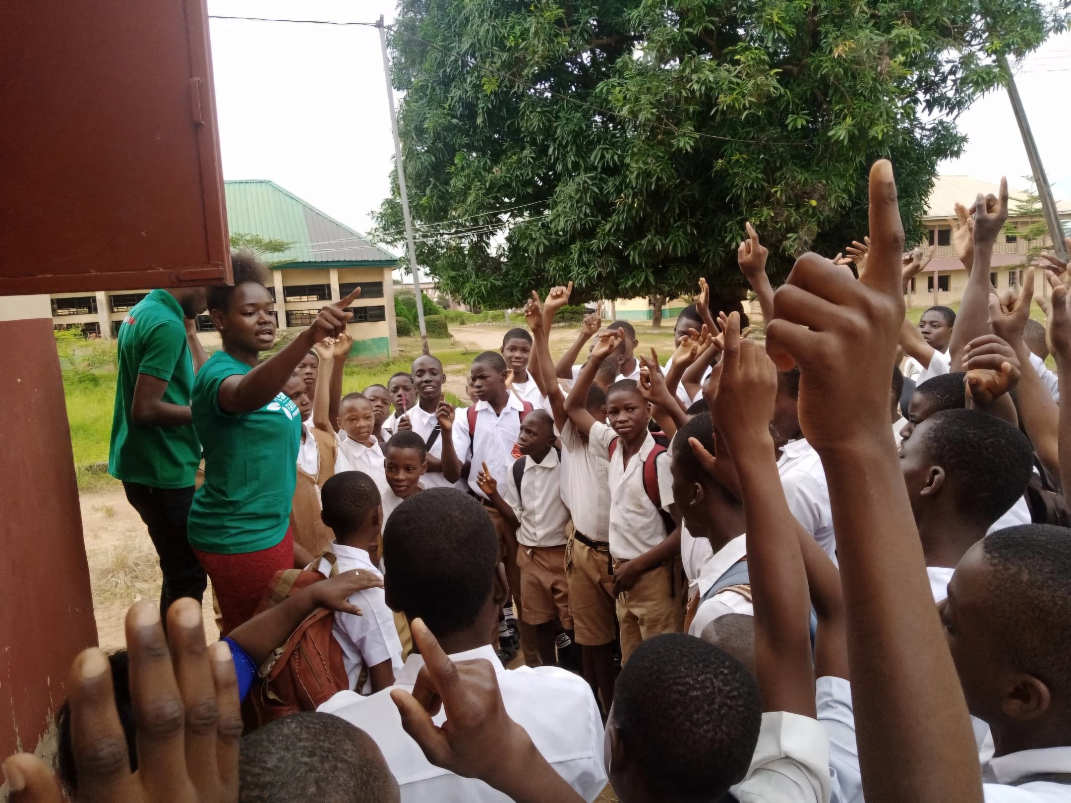 machukwu with students of Igwebuike Grammar School Awka during their Environmental Club Establishment.