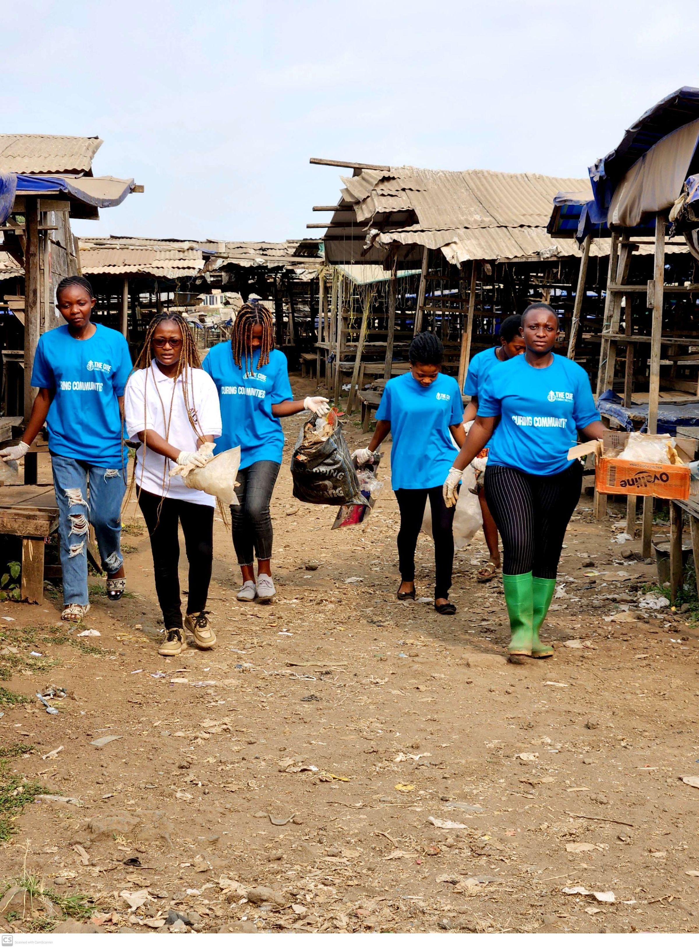 EE 30 Under 30 Awardee Nora coordinates Volunteers from The CURE International and THE Balanced Community to carryout a clean Up Campaign at the Buea Central Market. 