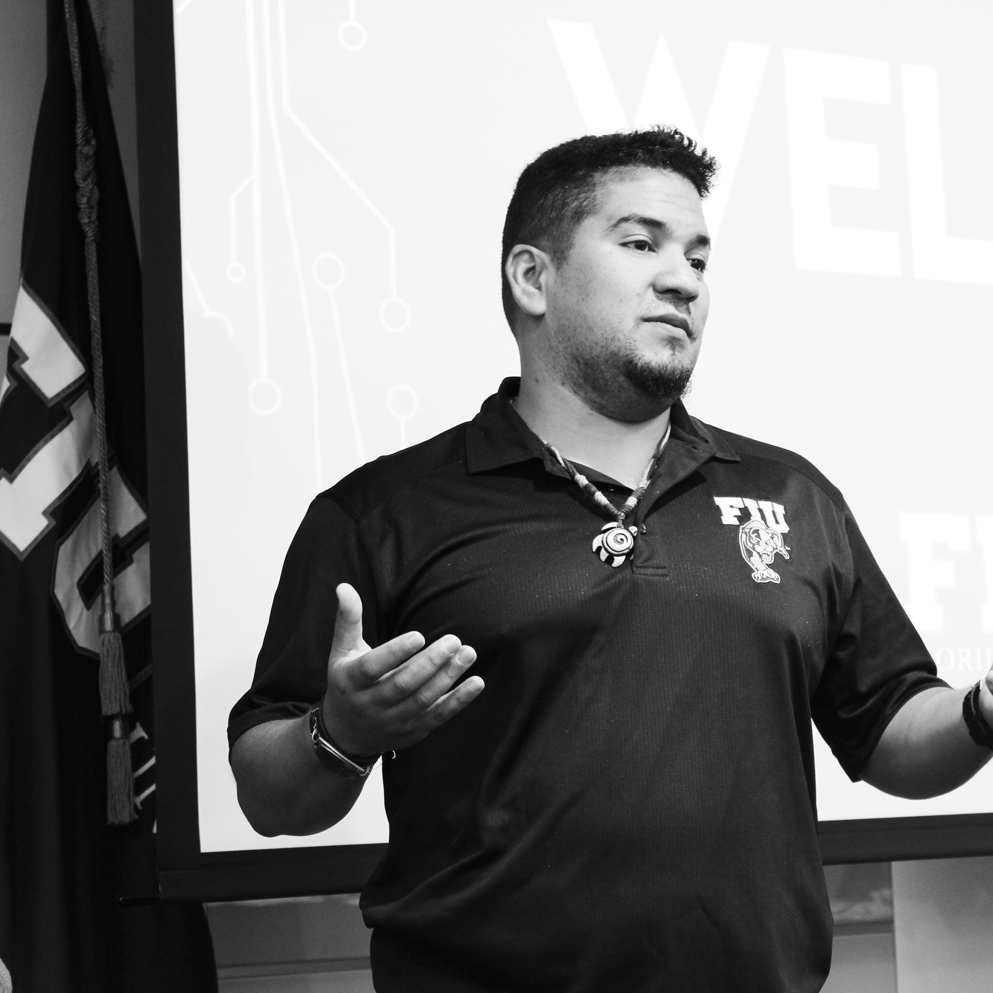 David speaking with hands palms up