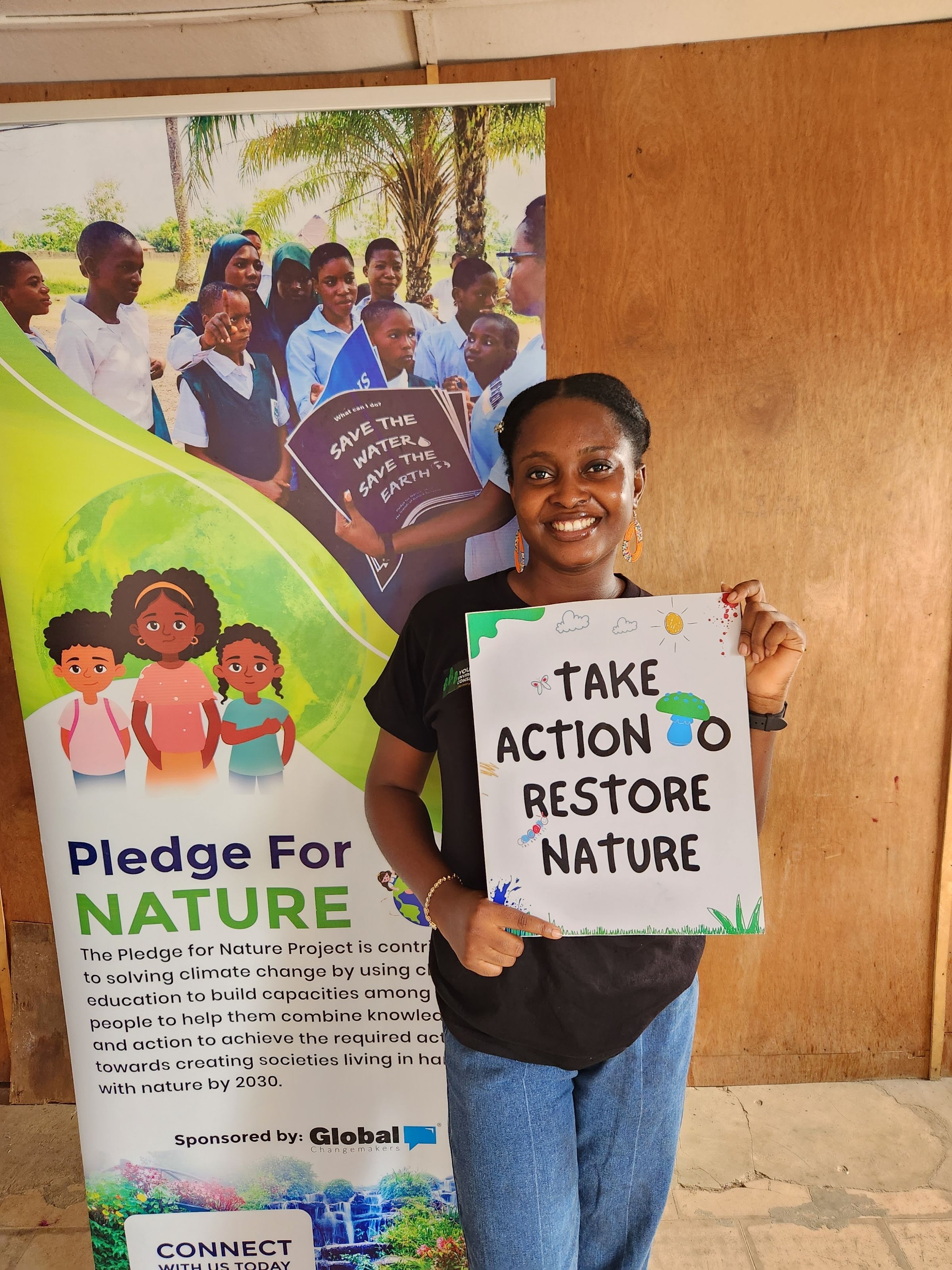 Favour holding a poster 