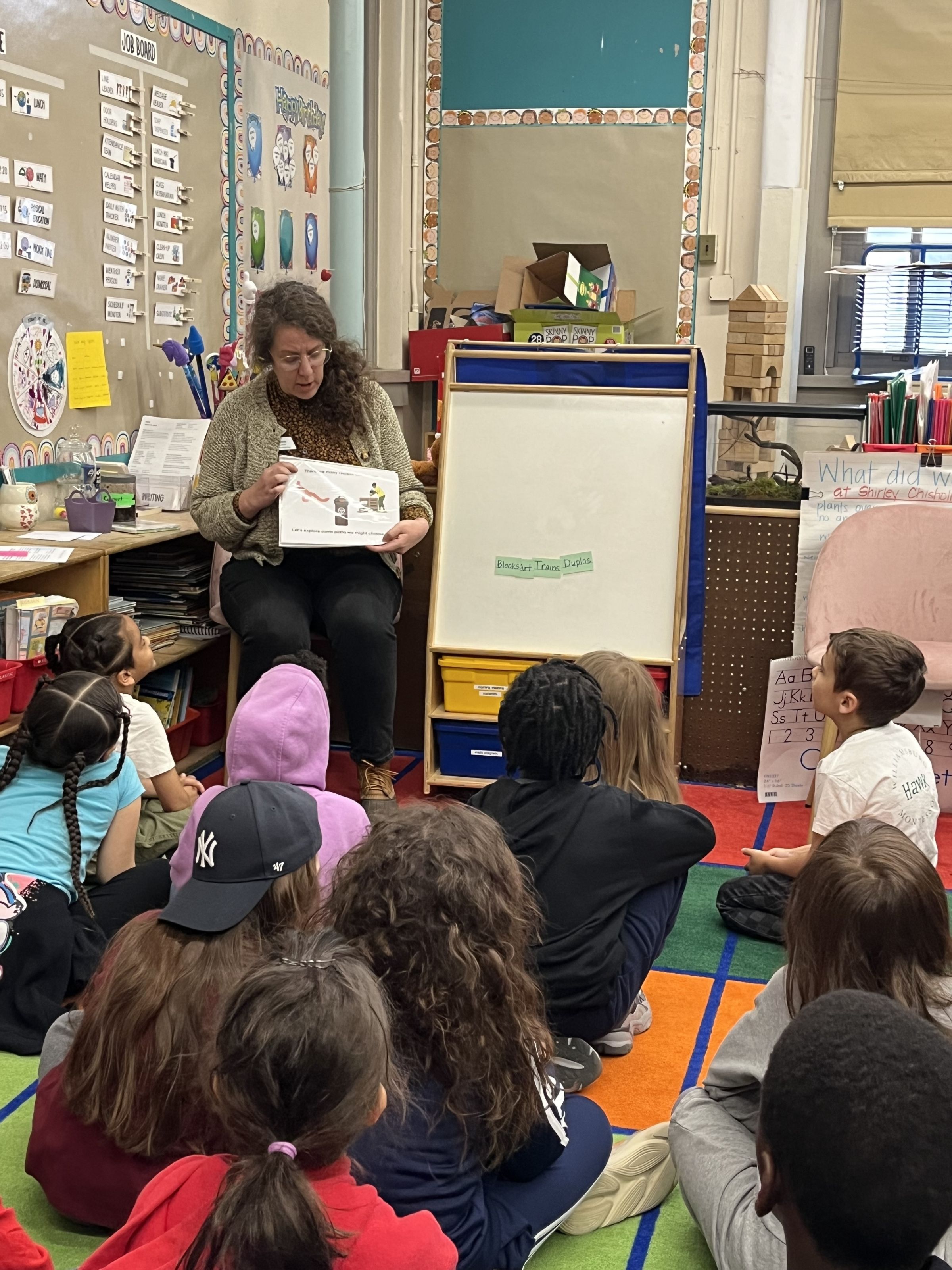 Fran in a classroom with young students