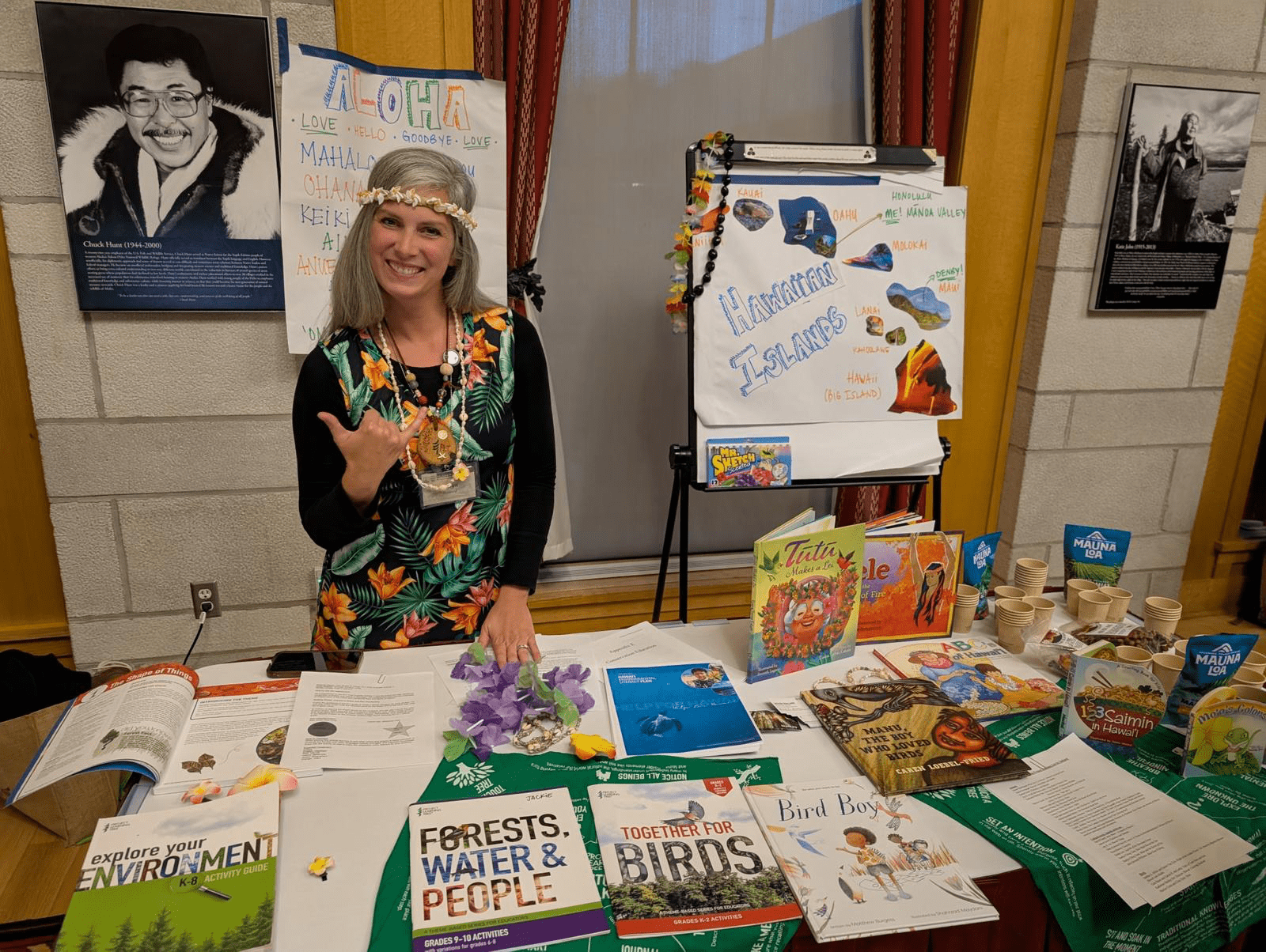 Jaclyn at a display table with PLT resources