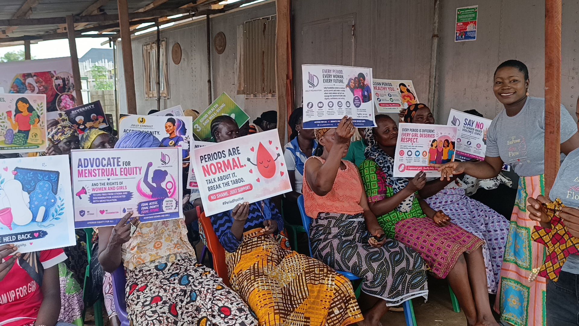A group of women holding posters