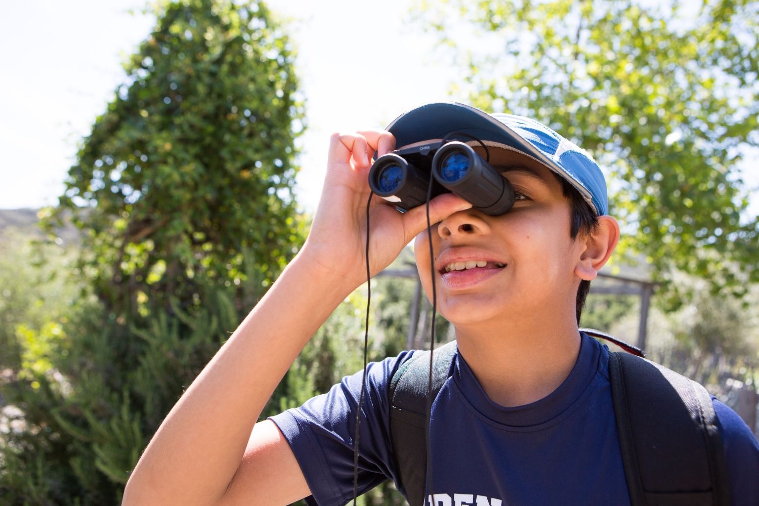 Student uses binoculars