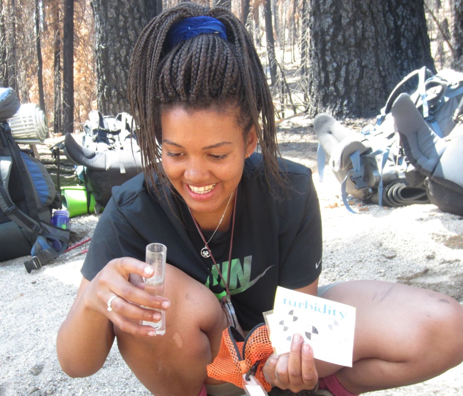 Student testing water quality